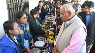 Rajasthan education minister Madan Dilawar interacts with students