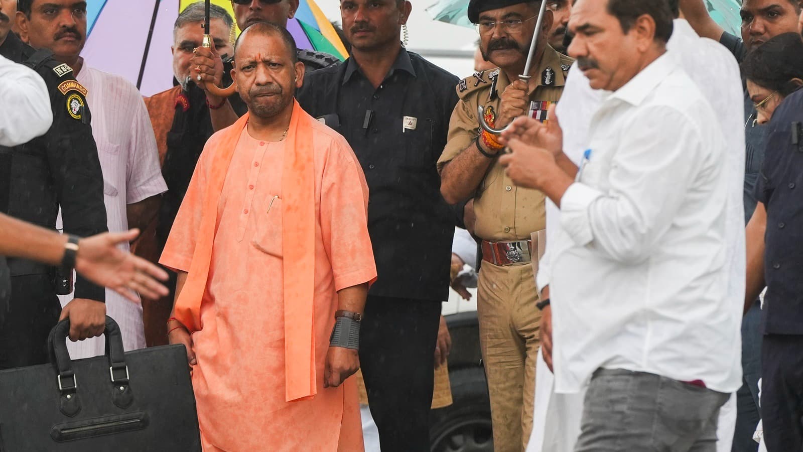 CM Yogi Adityanath during his visit at the site of the Hathras stampede which broke out at a religious congregation.