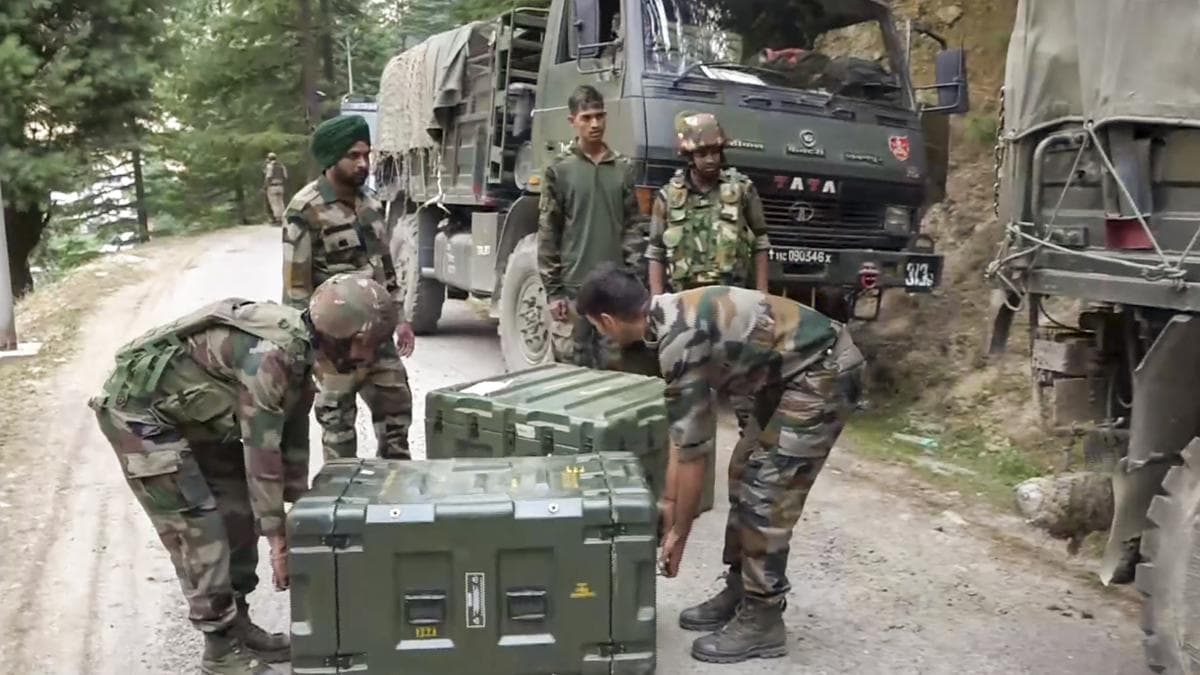 Security personnel near the site of an encounter with terrorists at Desa village, in Doda district. | Photo Credit: PTI