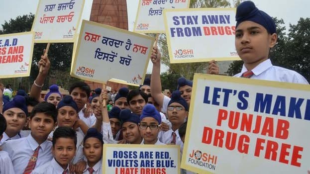 Cash for drug-free villages