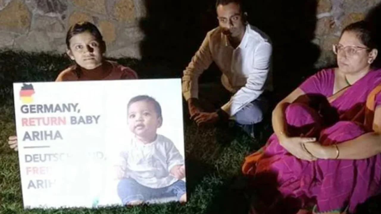 Ahira's parents outside German Embassy