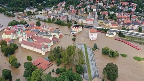 Devastating floods affect central and eastern Europe after continent's hottest summer ever