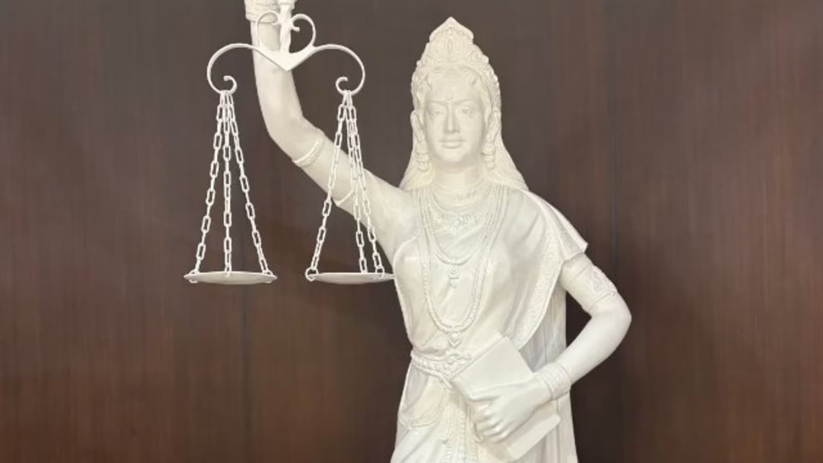 The new Lady Justice statue in the Supreme Court has shed its blindfold(X/@BimalGST)