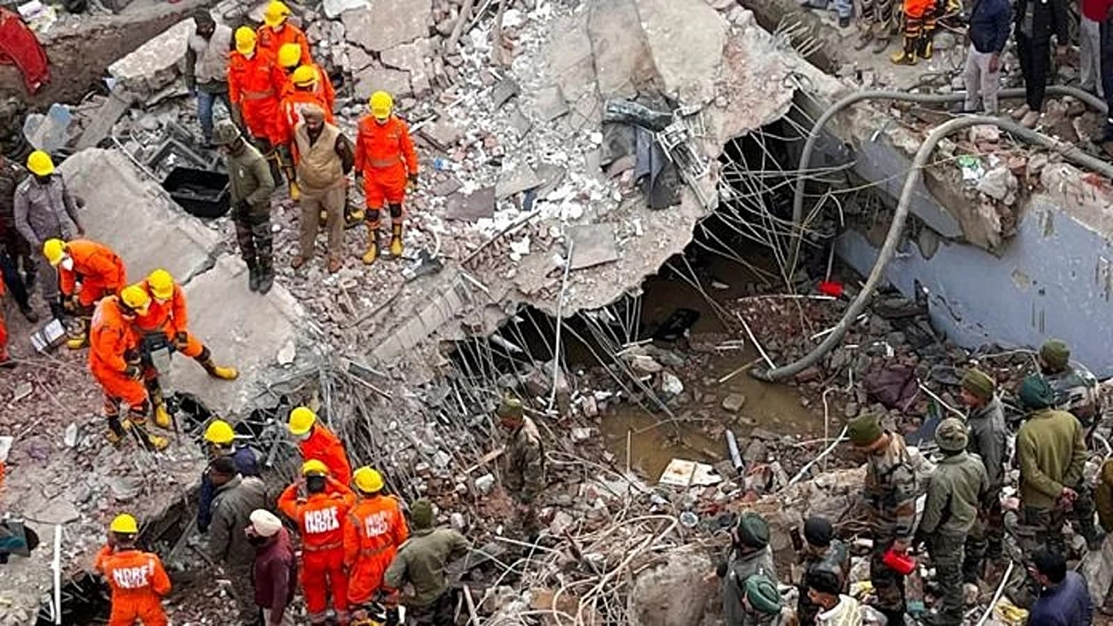 Rescue operation continues after a multi-storey building collapsed on the evening of Dec 22, at Sohana village in Punjab's Mohali district (Image Source: PTI)