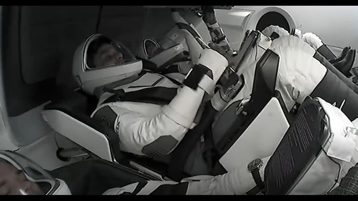 Shubhanshu Shukla (center) on board the Axiom 4 spacecraft. | Courtesy: Screenshot via Axiom