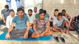 a group of Indian migrant workers