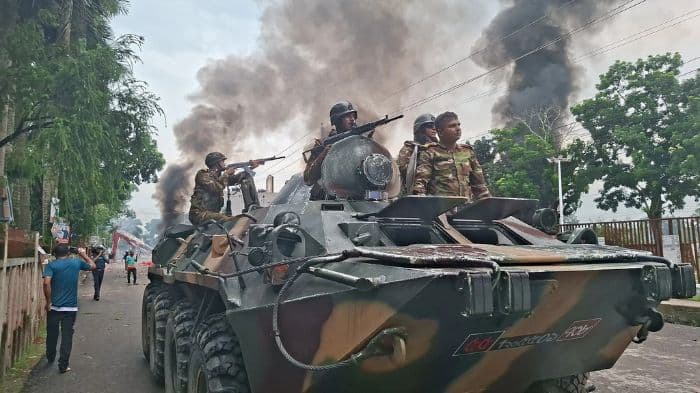 Violence erupts in Bangladesh as Sheikh Hasina loyalists storm hometown, torch vehicles