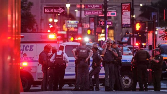 Gunman kills four, including NYPD officer, in Midtown Manhattan office tower shooting