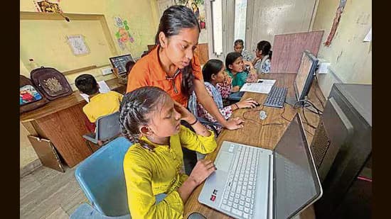 Hope in lanes: Slum kids rewrite their destiny through books and computers