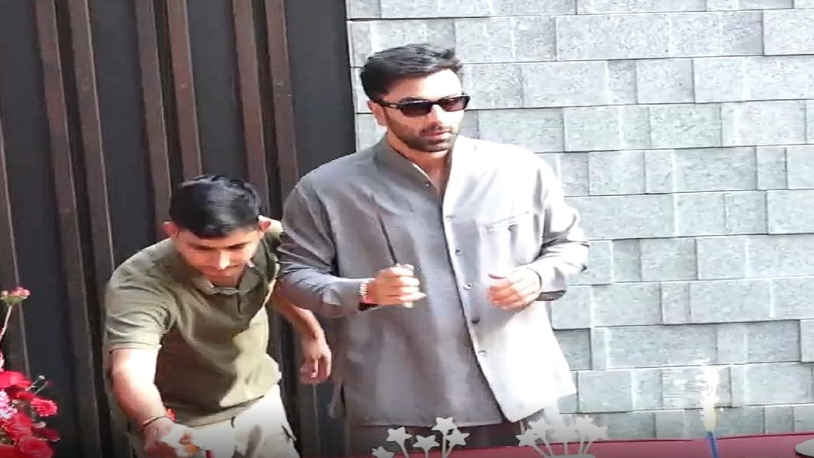 Ranbir Kapoor celebrates 44th birthday with paparazzi outside Mumbai home