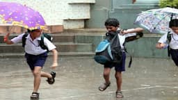 School building in Chennai amid heavy rain as five Tamil Nadu districts announce school holidays on October 21, 2026.