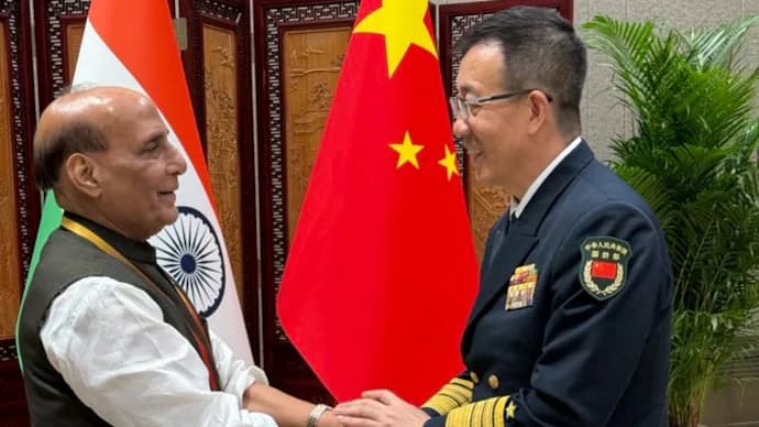 Defense Minister Rajnath Singh and Chinese counterpart, Admiral Dong Jun