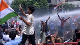 Police use water cannons on student protesters during a march over BPSC recruitment demands in Patna on Aug. 25, 2026.