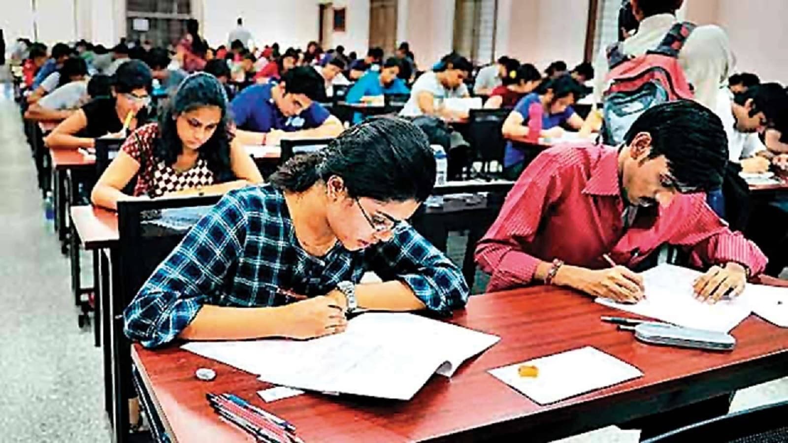Rural students in Maharashtra preparing for NEET and JEE entrance examinations under a free coaching initiative in Nanded.