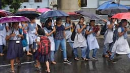 School building amid heavy rain and Cyclone Arnab weather alerts in India