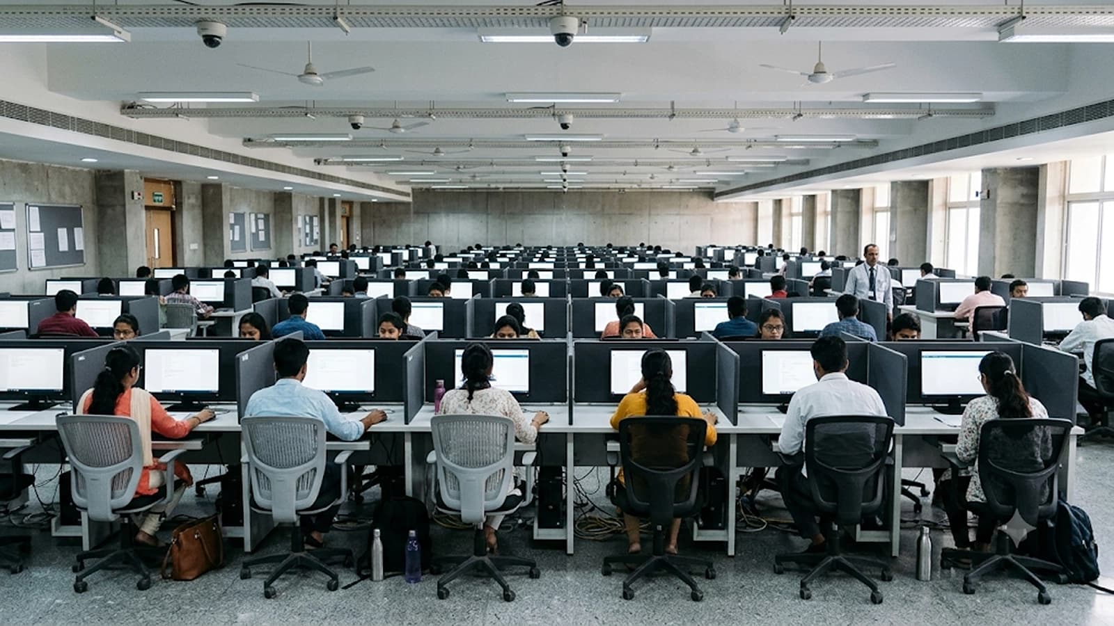 Students at an examination centre in India, illustrating proposed NTA reforms for computer-based NEET and stronger question-paper security.